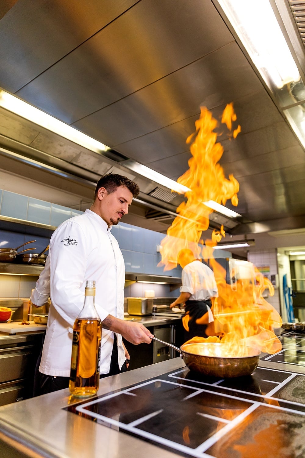 Cooking with fire in the Hanse Stube gourmet restaurant