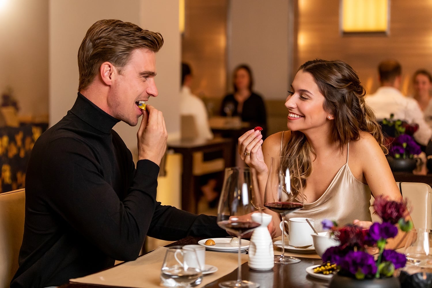 Couple at taku michelin starred luxury restaurant 